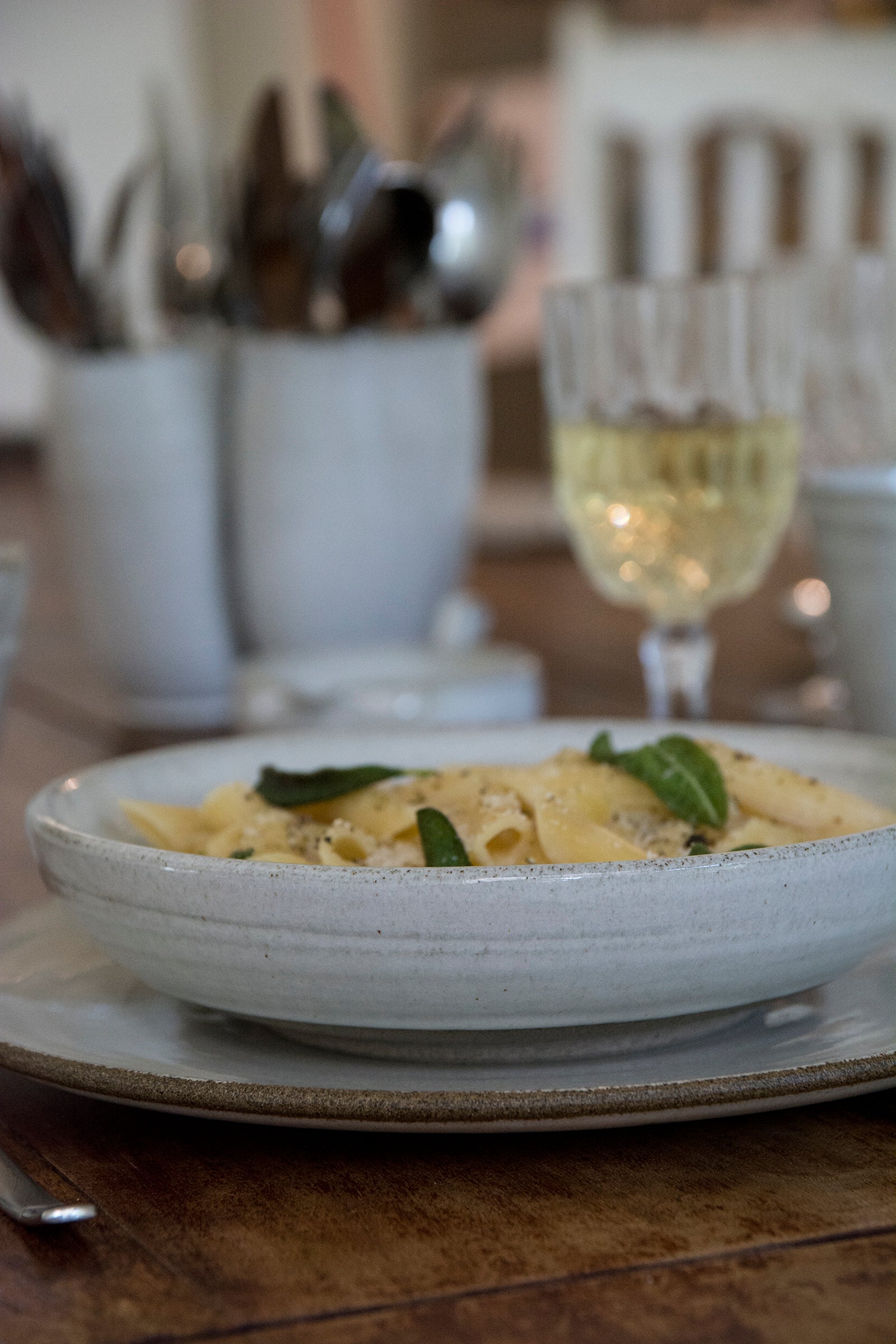 white pottery ceramic pasta bowl