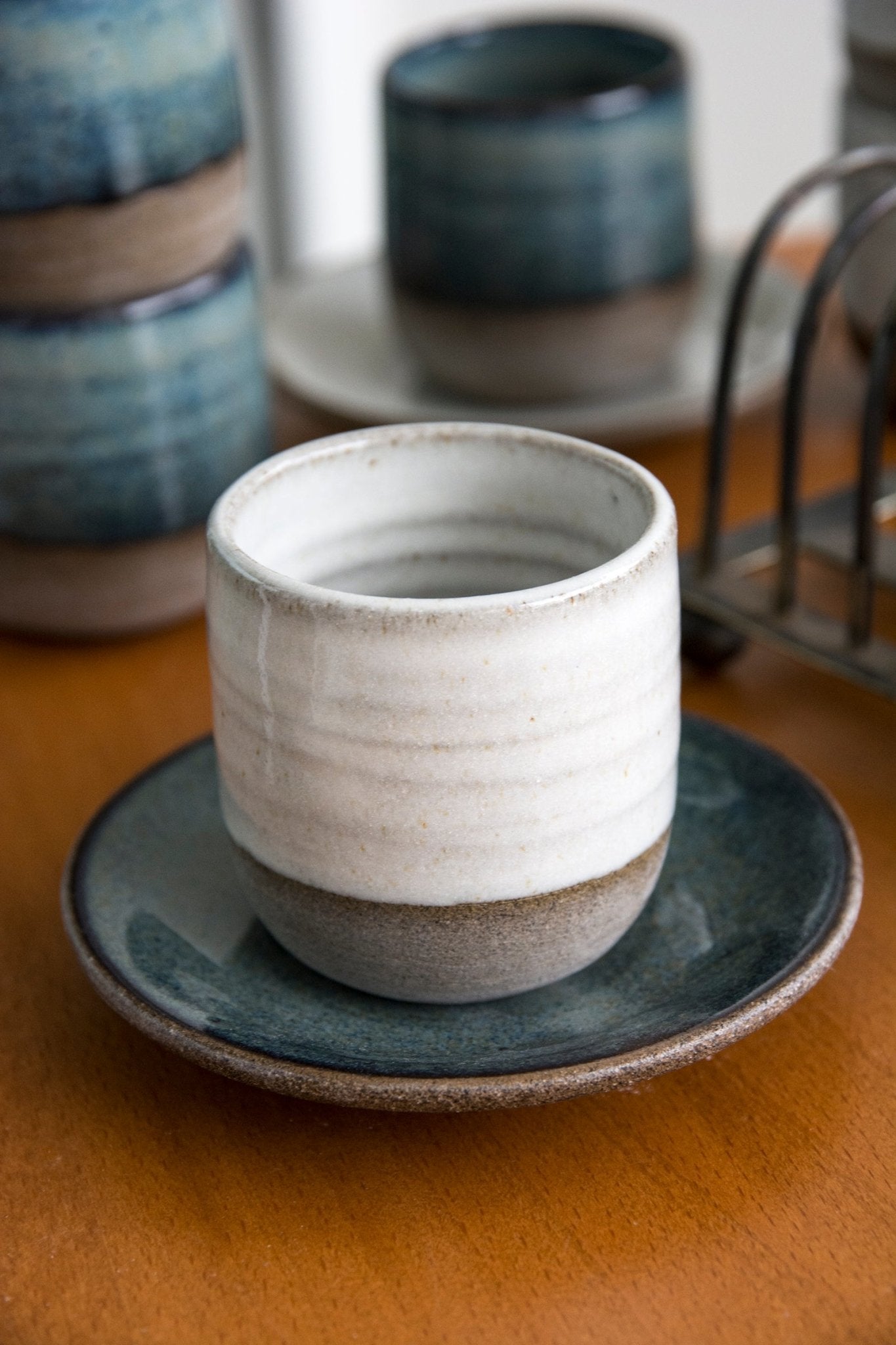 https://www.madaboutpottery.com/cdn/shop/products/colorful-ceramic-espresso-cup-and-saucer-494920.jpg?v=1643386515&width=1445