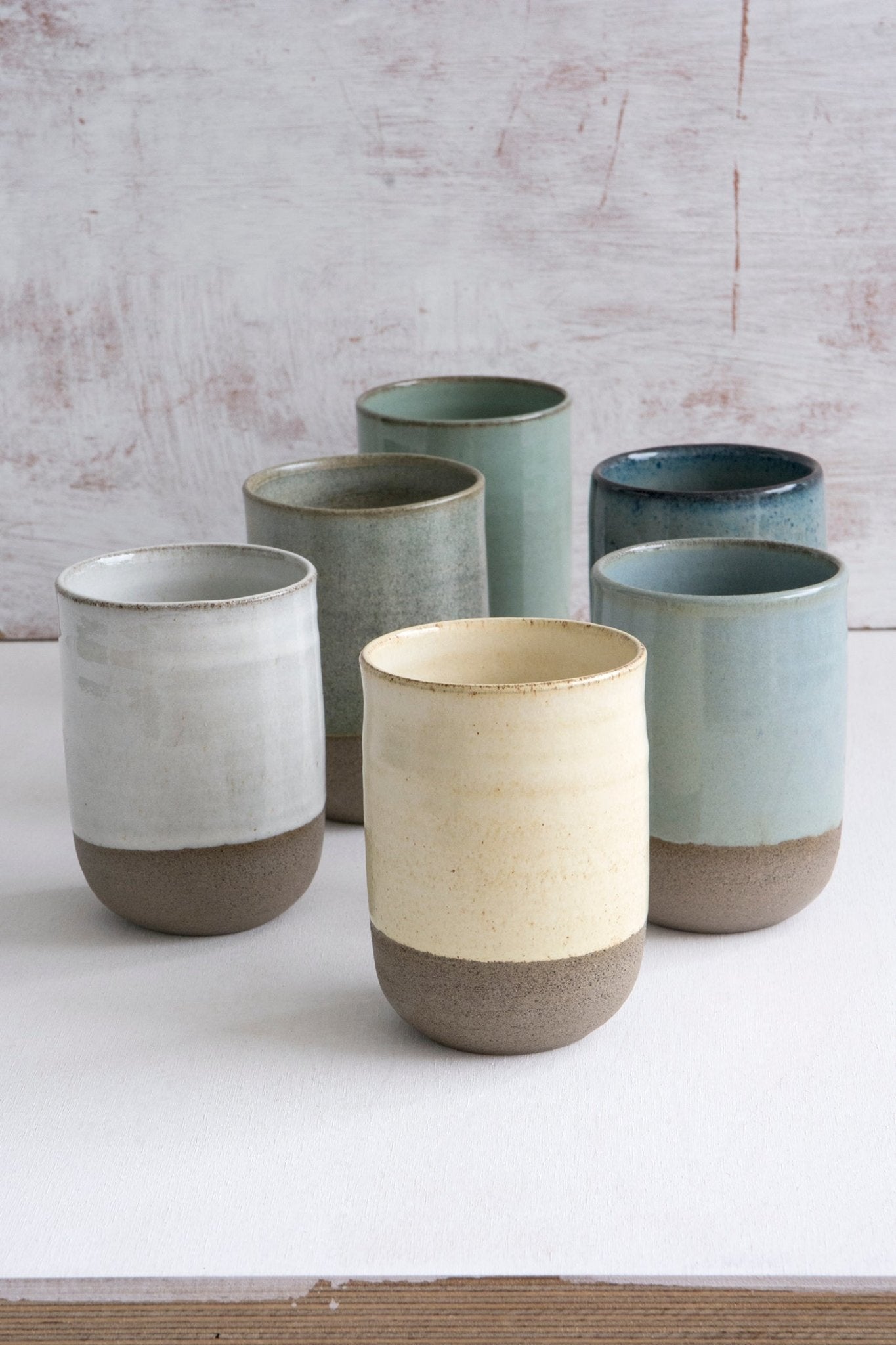 https://www.madaboutpottery.com/cdn/shop/products/colorful-stoneware-ceramic-tumblers-10-fl-oz-234149.jpg?v=1647799000&width=1445