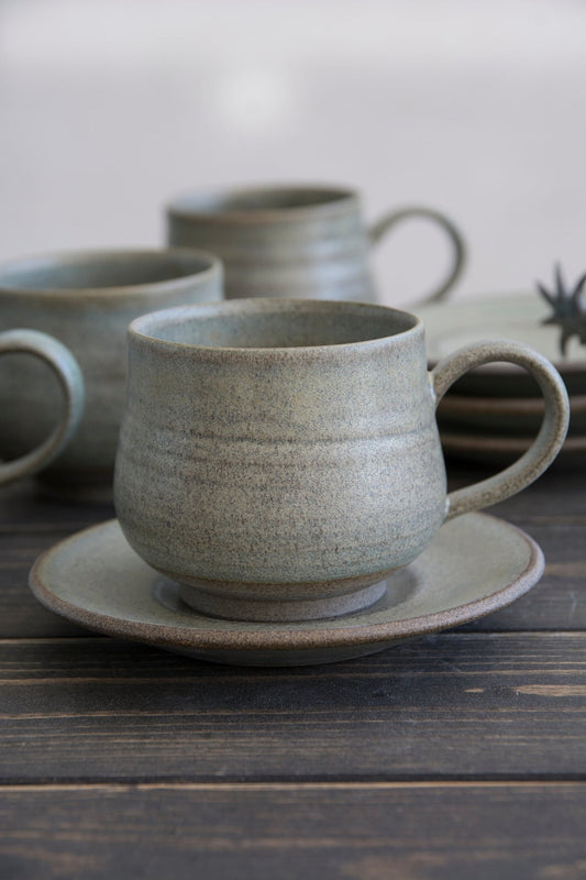 https://www.madaboutpottery.com/cdn/shop/products/green-sage-cappuccino-cup-5-fl-oz-697149.jpg?v=1651432788&width=533