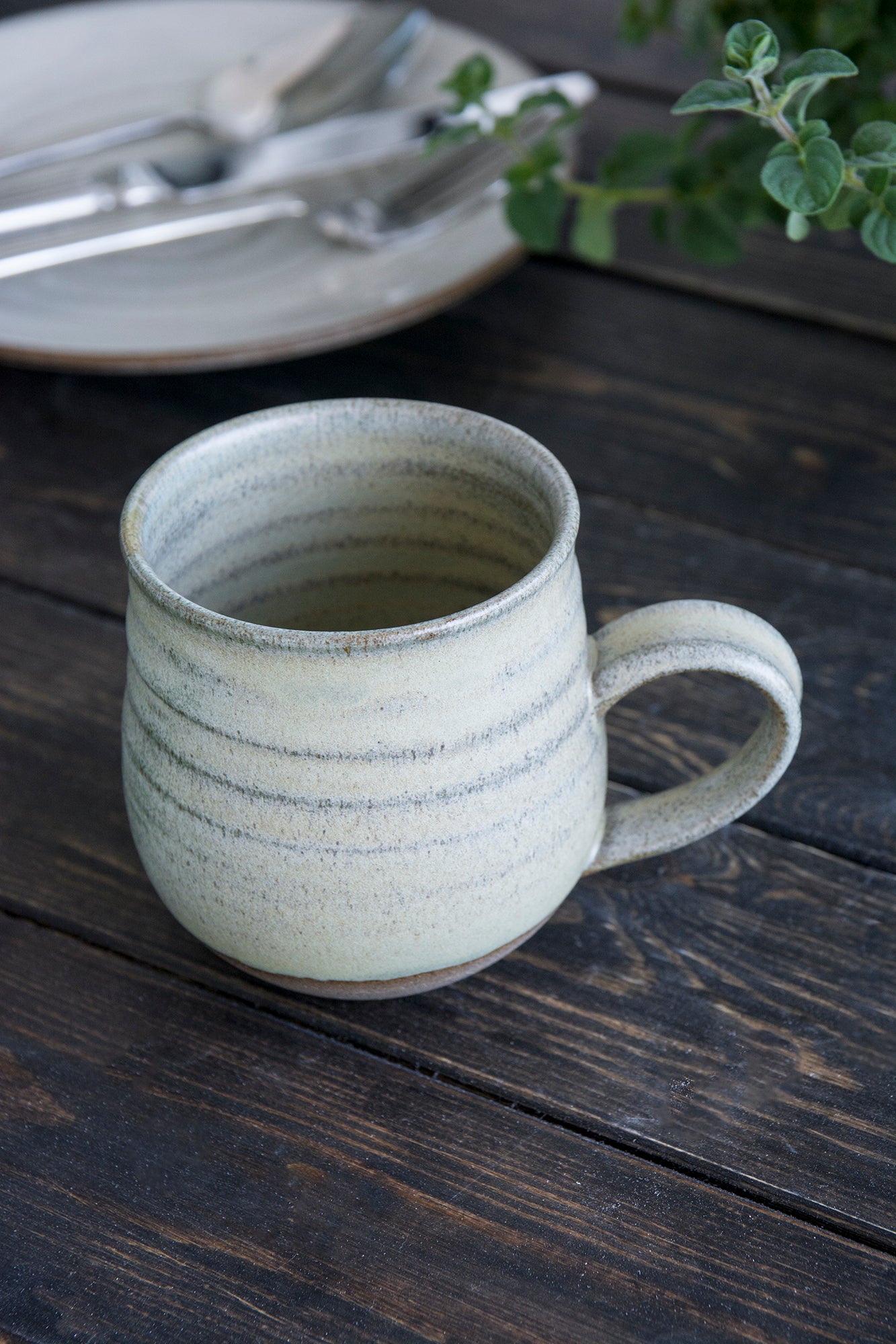 https://www.madaboutpottery.com/cdn/shop/products/handmade-pottery-coffee-mug-213067.jpg?v=1672850176&width=1445
