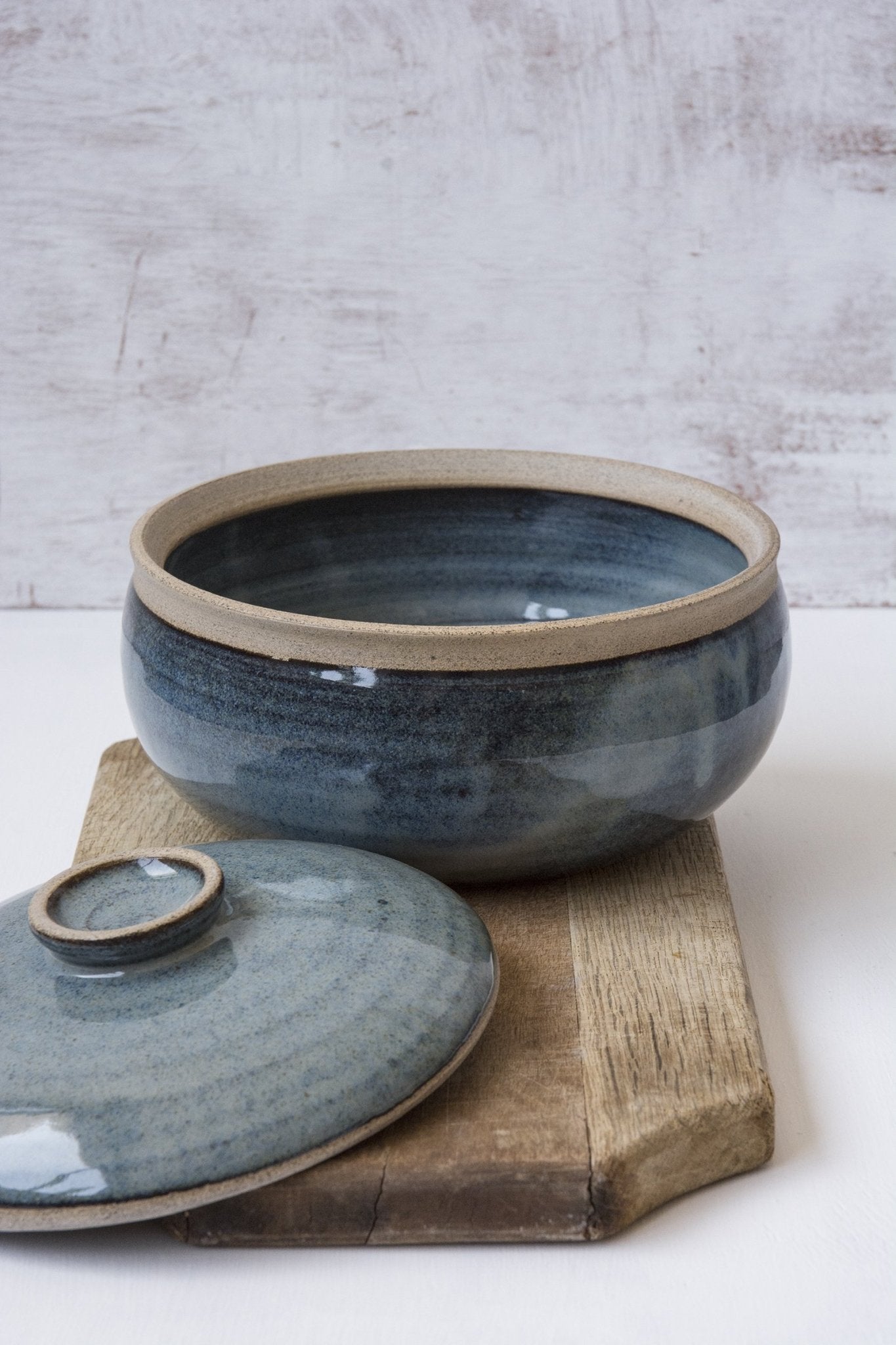 https://www.madaboutpottery.com/cdn/shop/products/lidded-blue-ceramic-casserole-dish-893920.jpg?v=1675107034&width=1445