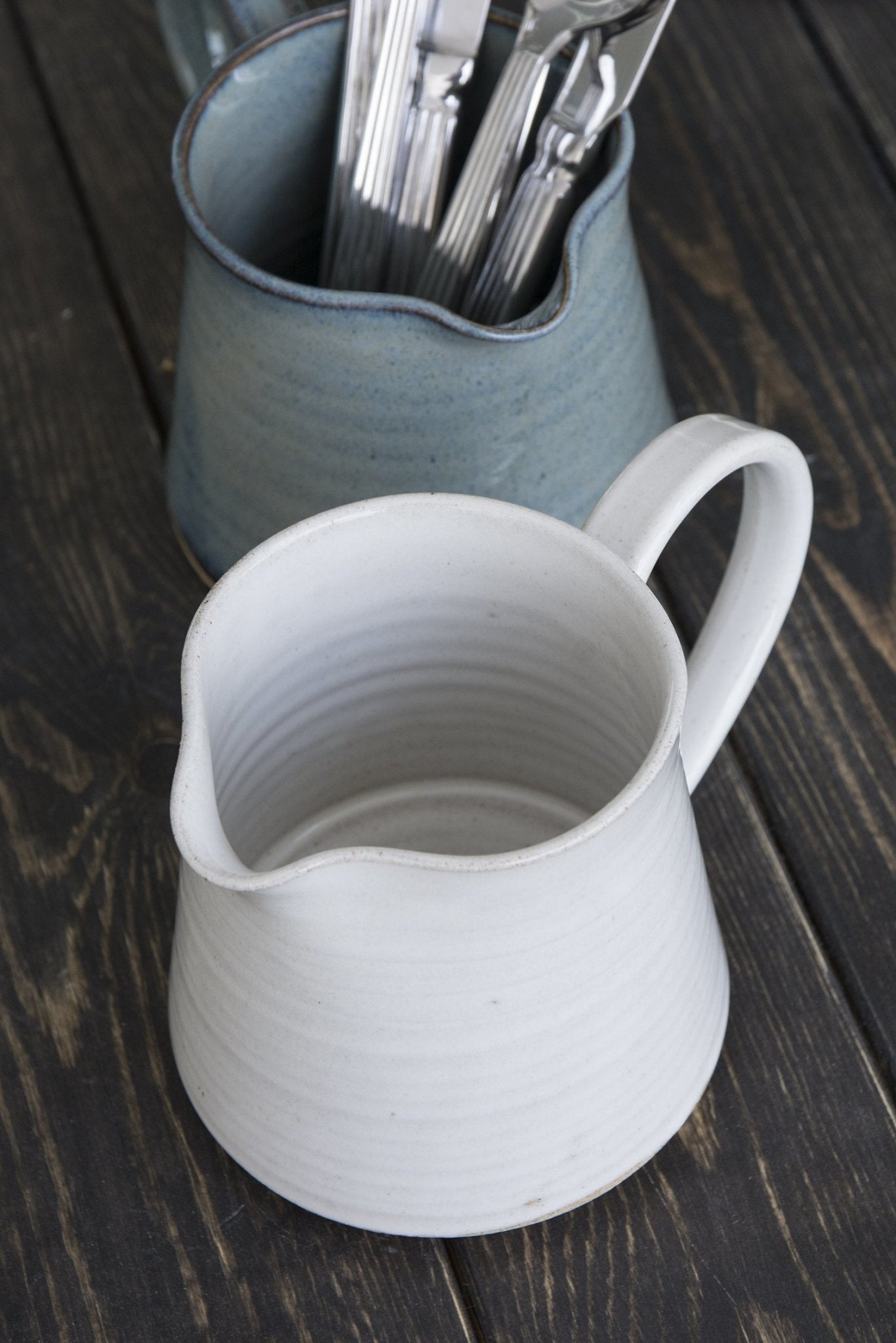 https://www.madaboutpottery.com/cdn/shop/products/pottery-pitcher-880385.jpg?v=1635556040&width=1445